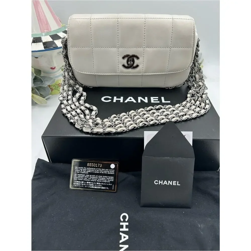 Women's vintage Chanel multi chain quilted flap bag made in Italy PRISTINE